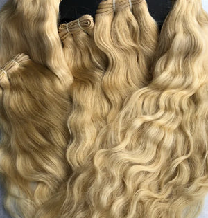 Our LHS Cambodian Blonde (#613) Luxe Natural Wave bundles at the weight of 100 grams each and come 100% single donors. The hair has been pre-lifted for convenience and is of high quality. It is easy to dye and tone and can last up to 4-5 years with proper care.