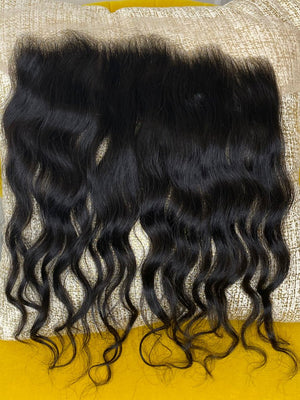 Our 100% Cambodian Luxe Natural Wave 4 X 13 Frontal is great for clients who are looking for a seamless, undetectable, natural-looking finish. Our Frontals are made using a technique that makes the hairline look like it is growing naturally from your own scalp. Frontal Closures are available in length 14" or 16" with a 4 by 13-inch lace base. Note: Frontal knots do not come bleached.